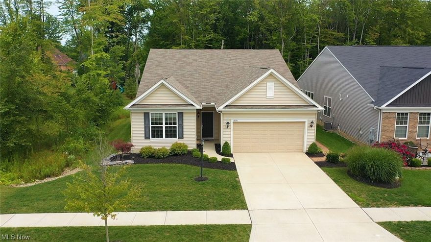 Welcome to the Enclave at Fieldstone Preserve in Strongsville! This stunning ranch home built in 2018 spans across an impressive 2,330 square feet. Nestled within a limited maintenance community, you can leave behind the hassle of mowing grass and shoveling snow, as these tasks are thoughtfully included in your low monthly maintenance fee. Situated on a generous .20 acre lot, this home boasts a fenced backyard that backs up to serene woods. The floor plan has been cleverly flipped to maximize the views & privacy of the adjacent nature preserve. The open floor plan that seamlessly blends functionality & aesthetics. The spacious kitchen is perfect for any culinary enthusiast, complete with an island and an abundance of cabinet space.The master suite is a true retreat, featuring its own private bathroom and a walk-in closet .Bedrooms 2and 3 offer ample space. A Bonus flex room adds a touch of versatility. This space could easily be transformed into an office, a craft room, or anything els