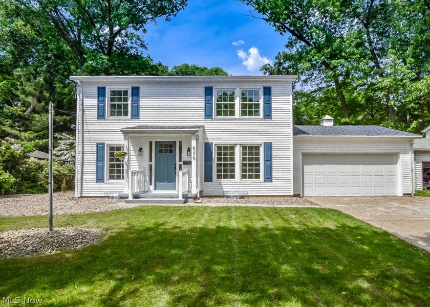 Wonderfully updated 3 bedroom colonial in the desirable Canyon Park neighborhood of Merriman Hills. The main floor features a charming vestibule entry with a new front door and built-in bench with coat hooks. In the living room, there’s an accent wall, newly installed recessed lighting, and wood-look vinyl plank flooring that continues into the brand new kitchen. This kitchen showcases new cabinets, quartz countertops, tile backsplash, stainless steel appliances, and an unobstructed view into the family room. The formal dining room is perfect for everyday meals and special occasions. A guest bath rounds out the 1st floor. Upstairs, you'll find three great bedrooms with large closets, including the master with a walk-in closet and an en suite with a tiled shower, extended vanity, and shiplap accent wall. The secondary bathroom is equally impressive and includes a tub/shower combo. Additional living space is available in the lower level, adding a rec room for family entertainment. Outside, you'll appreciate the patio overlooking the nice-sized backyard with a wooded backdrop and creek. Recent improvements include all new windows, lighting, garage service door, entry door, flooring, plus the roof, siding, and gutters that were replaced in 2023. The location can't be beat with Canyon Trail Park nearby and just a short drive to Sand Run Metro Parks and Towpath Trail! Schedule your showing today!