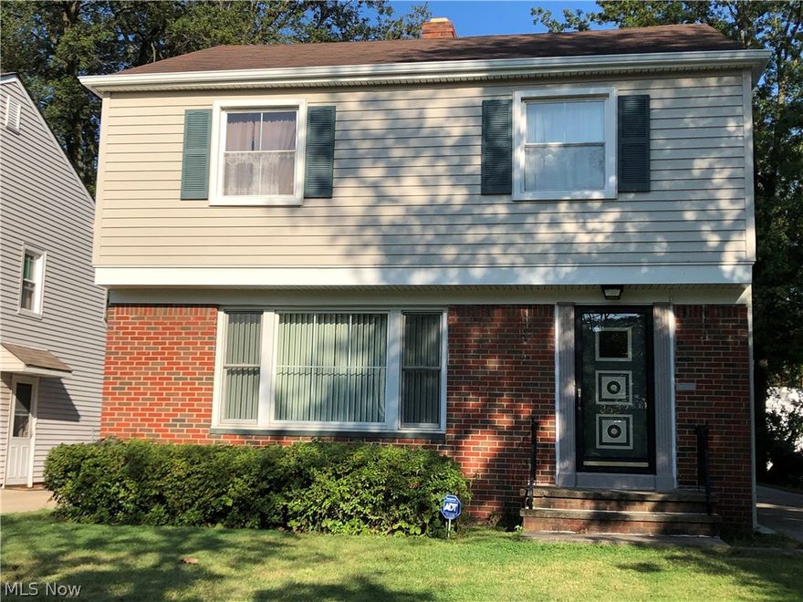 Lovely 3 bedroom brick/vinyl colonial located on a prime Shaker Hts. street.  This home has great curb appeal with a beautiful landscaped yard.  The outside features:  newer windows throughout, long concrete drive,  outside patio,  glass blocked windows, central air,  waterproofed basement in 2017,  and a 2 car detached garage.  Enjoy the first floor with a large living , dining room with gleaming hardwood floors ,a oversized updated kitchen and first floor half bath.   The first floor also has a large family room off the dining room for quite enjoyment for rest and relaxation.  The second floor has 3 large bedrooms, 1 full bath and lots of closet space.   The sellers are offering a home warranty as well as many appliances will stay. (stove, refrigerator, washer, dryer) The lower level has a finished basement, updated electrical ,  lots of storage space and has been freshly painted throughout the entire home.  The POS has been ordered and the house will be violation free.  This home is