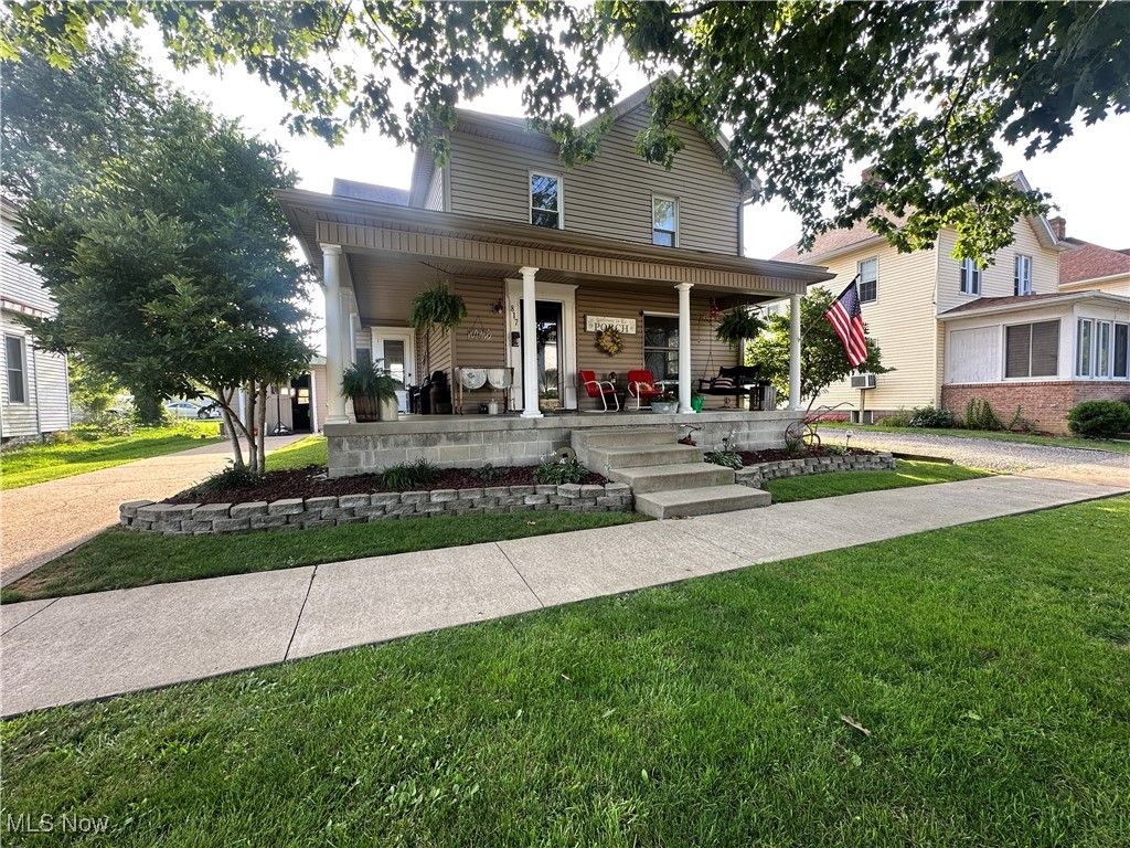 Welcome to 817 Walnut Street in Caldwell, Ohio—nestled on one of the town's most beautiful streets. This spacious two-story home offers four bedrooms, one and a half bathrooms, and a warm blend of original charm and thoughtful updates throughout.
Inside, you'll find stunning natural woodwork, including original trim, doors, and built-ins that add character to every room. The main floor offers multiple living areas, a decorative fireplace, and a bright, updated kitchen with a center island and ample storage. The layout provides both comfort and functionality, perfect for everyday living and entertaining.
Upstairs features four generous bedrooms and a full bathroom with classic finishes. The main level also includes a convenient half bath and additional living space that can be used as a formal dining room, office, or second sitting room.
Outside, enjoy a beautiful wrap-around front porch—ideal for relaxing or greeting neighbors—as well as a cozy back patio perfect for evening gatherings. The one-car detached garage adds convenience and extra storage.
All appliances are negotiable with the sale of the home. Central heating and cooling provide year-round comfort. This well-maintained home offers the perfect blend of original charm and modern updates, right in the heart of Caldwell.