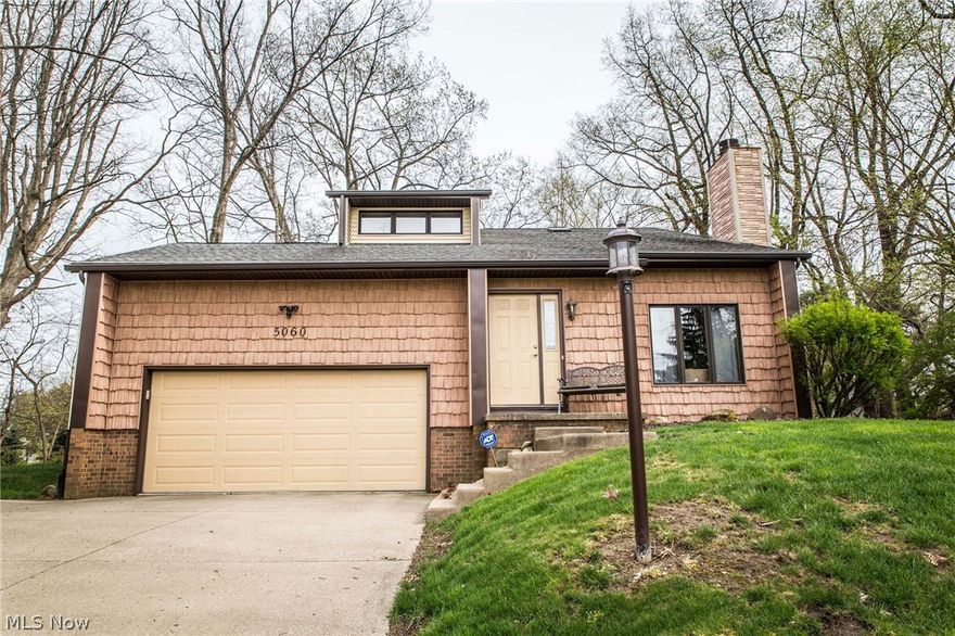 HELLO GORGEOUS! This contemporary build sitting pretty hilltop in Irish Oaks--*absolute prime location in Jackson Schools* minutes from highway access + many amenities. The home includes almost 2000 square feet of living space, three bedrooms, three full baths + 1/2 bath. (Potential 4th bedroom in basement or additional living space- whichever you prefer). Entering through the foyer into the great room you will find the home is warm and inviting. Great room includes vaulted ceilings, mini loft (perfect for décor), & seated fireplace. Continuing into the home you will find the open floor plan. Sunken Kitchen & dining combo completely renovated (2010,2013). All new cabinetry, island area, fixtures, unique double sink (take a peak once you stop by), & all new stainless steel  appliances (2013). Kitchen connected to family room--perfect for entertainment. All new flooring on first floor & tastefully painted throughout! Sliding doors lead to deck overlooking backyard. 1st floor laundry + re