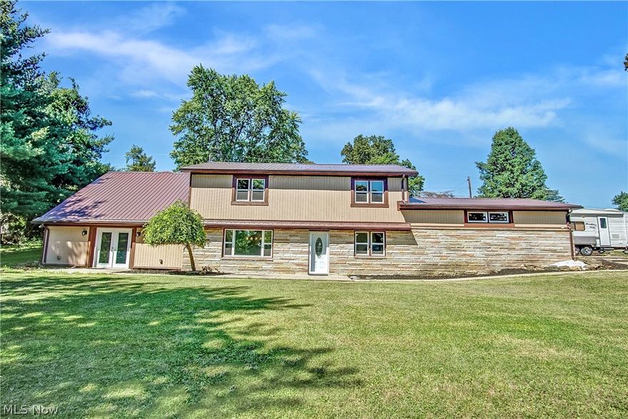 This spacious home on the Northend of Zanesville, on a corner lot, is conveniently located near all of the amenities of living in town but tucked away on a little culdesac, off Dresden Rd.! With 4 bedrooms, 2 1/2 baths and over 3100 sq. ft of living, there is plenty of room to spread out or even grow! Open concept, and completely move in ready! Furnace, HVAC, metal roof & gutters all new in 2021! All new windows, doors, light fixtures, vents and much of the flooring is new! There is a bonus room that could be an office, additional storage or a playroom! The master bedroom is sure to please with a master bath and French doors that lead out to the deck to read a good book or drink some coffee in the morning! Call today before this one is in contract!