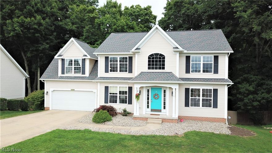 Welcome to 3111 Ravineview Circle in Stow! This impressive home – located in Timbercreek Estates – has 6 bedrooms and 3.5 bathrooms. Step inside the front door to the open foyer that leads to a formal dining room, an office with built-in shelving, the living room with a gas fireplace, and the eat-in kitchen. Off the kitchen, there is a large, screened-in deck (recently painted in 2019) overlooking the backyard (deck furniture included with house!). Stairs from the deck lead directly to the backyard. The kitchen has a large island offering more storage and counter space, along with a convenient breakfast bar. Head upstairs to find 4 spacious bedrooms. The owner’s suite has a full bathroom with double sinks and a soaking tub, a walk-in closet, and a gas fireplace. A second full bathroom with double sinks is located on the second floor. The finished walk-out basement has a full bathroom and two additional bedrooms. Laundry room is located on main level with a new washer. Attached two-car