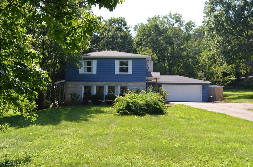 Incredible renovation!! This property has been completely redone with incredible design and thought to the floorplan and details. The main floor has a large custom kitchen, fully applianced with custom details including a pot filler over the stove and quartz countertops. Beautiful island is open to the sitting area that overlooks the front yard and includes a new stone fireplace. There is an additional wood burner insert in the second fireplace off the living room. Off the kitchen is a dining area that includes sliding doors to a covered porch area. Moving to the second level, the master suite is stunning. Custom ceiling, walk in closet includes custom built ins with an additional closet. The master bathroom-WOW! Great soaker tub and large tiled shower with glass doors and custom double vanities. Laundry is located on the second level. Outside, enjoy privacy under the mature trees in the front or back yard. NEW Furnace and A/C.