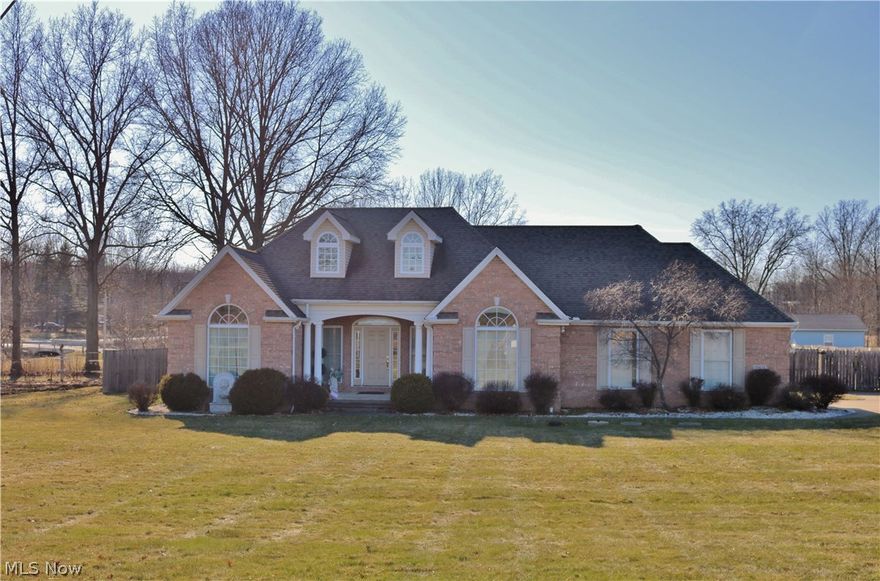 A beautiful 3 bdrm 3 bath ranch sitting on over a half an acre! Custom built with a large open floor plan, vaulted ceilings, and hardwood floors throughout. A full basement with endless potential! Lovely custom lighting in every room. Tons of large windows grace the walls of every room in the house. A master features a large master bathroom with a Jacuzzi tub and walk in shower, under skylights. Clean, well cared for, annually serviced mechanics, furnace, sump pump, and septic. Walk through the front door and enter into an elegant foyer, and entertain guess in the living room, in front of the fireplace while you prepare hors d'oeuvres or clean up from dinner, either way, in this open floor plan, you can host and mingle at the same time. The basement has a finished office space and a full bath, with walk in shower and ceramic tile. One floor living, of the finest kind! Fully fenced in yard, 2 car attached garage, concrete patio and a long private driveway. An amazing place to call home!