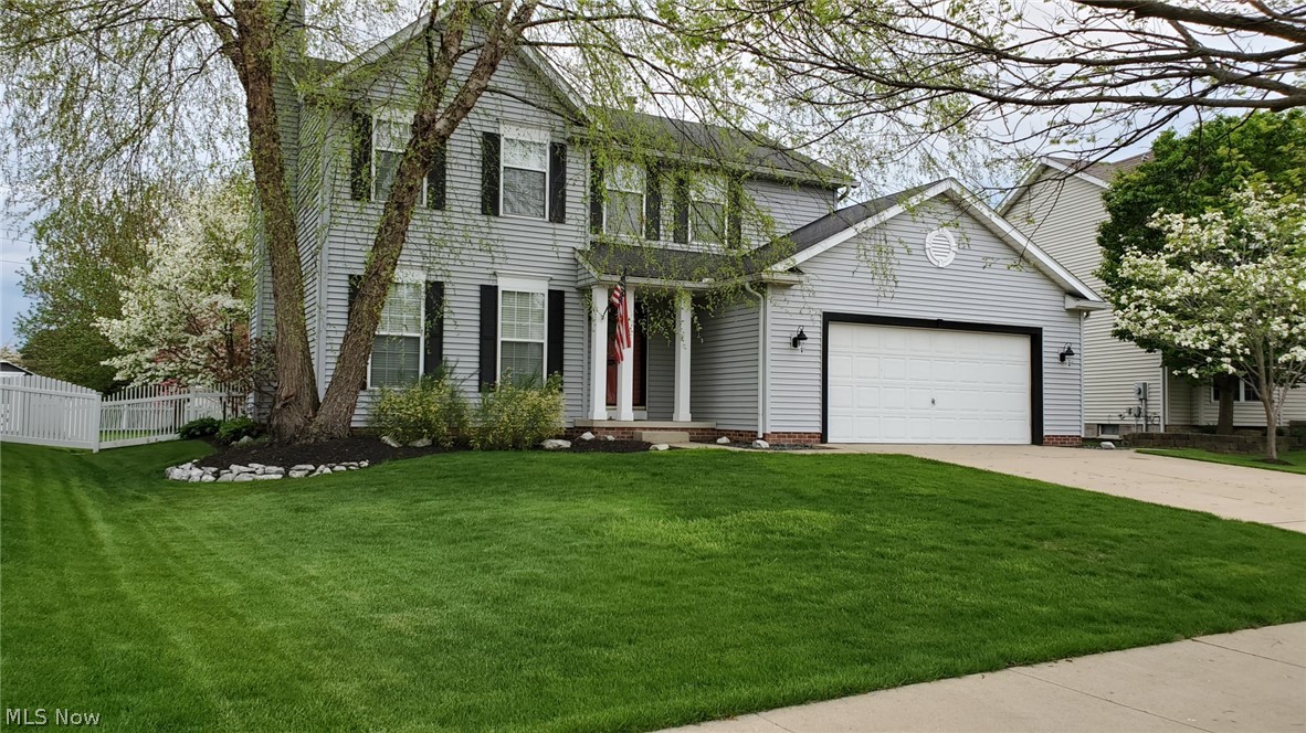 Check out his meticulously maintained one-owner home situated in Coventry Crossing featuring a beautiful larger backyard with custom vinyl fencing and irrigation system. Enjoy the shade trees on the brick patio under the 11 x 16 pergola next to the private hot tub pad! A 8 x 12 custom-built shed provides additional storage. This house has many features added during construction not typically found in other homes in the neighborhood such as an additional 2-foot extension (larger living room and bedroom), 2-foot wider garage, 2-foot wider driveway and an extra course of basement blocks for a higher basement ceiling and a steel beam (no support pole to get in the way). There’s a sink in the garage, interior wall insulation for sound control and a fully dug out basement for even more space. The extremely clean interior features newer solid hardwood floors in the living room, kitchen, and dining area with a gas fireplace. The kitchen offers newer multi-featured stainless-steel appliances an