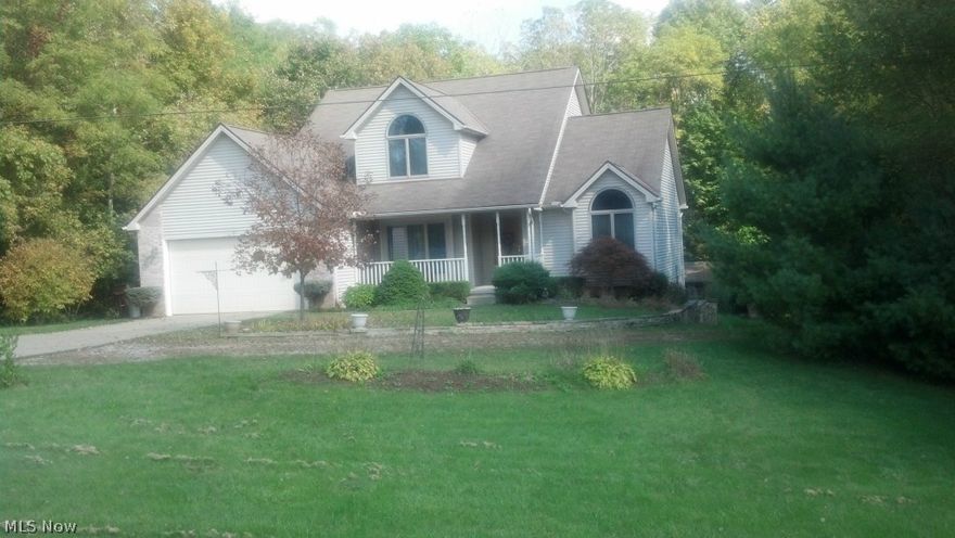 Stunning 5 bedroom Cape Cod boasts 2800 sq. ft. of living space nestled on 2 sloping acres. Includes a 2 BR In-law suite w/living room, kitchen and full bath.  3 full baths and 1 half. Also has large rec room. First floor living includes master bedroom with full master bath that includes Jacuzzi tub, walk-in shower and walk-in closet. Gorgeous great room with see thru fireplace, cathedral ceilings and large eat-in kitchen, both having views and entrance to deck area that overlooks rolling acres of country living! Upstairs has 2 BR and full bath. 2 car attached garage, storage shed w/electric and wood burner, large barn.