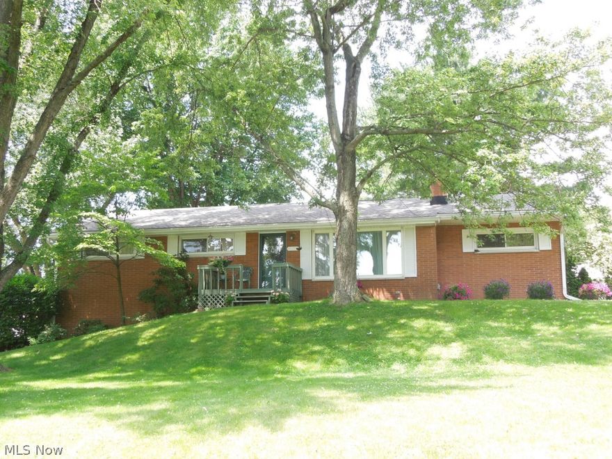 You'll be proud to call this wonderful brick ranch in Plain Township your home!  This ranch home sits on a beautiful corner lot and features: Three bedrooms, two full baths, and one half, spacious living room with wood burning fireplace, first floor family room with wood burning fireplace, two Dutch doors add to the charm, kitchen with plenty of cabinets, counter tops & breakfast bar, appliances remain, a 10 x 20 storage barn, partial fenced in yard, and a two car garage.  Home warranty for your peace of mind!  Truly a must see!