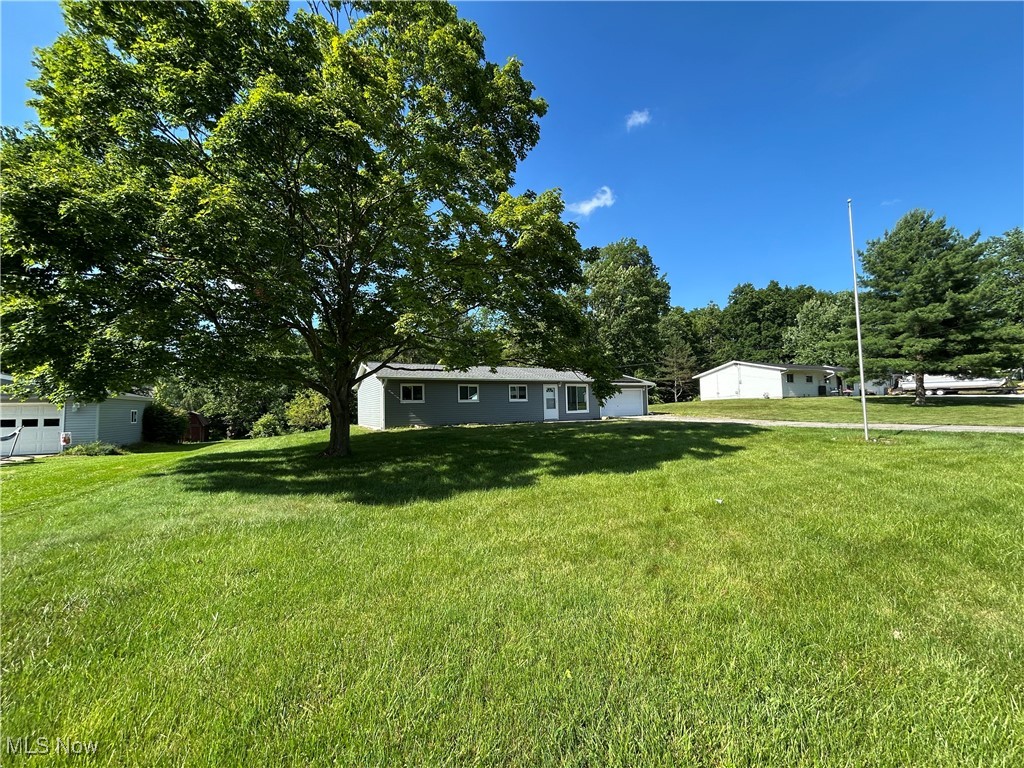 Beautifully renovated 3-bedroom, 2-bath ranch in the highly rated Aurora School District. Nestled on over half an acre at the end of a quiet dead-end street, this move-in ready home offers modern updates, serene surroundings, and energy-efficient upgrades throughout.
Step inside to an open-concept living space where the living room flows seamlessly into the dining area and stunning new kitchen, complete with updated cabinetry, quartz countertops, stainless steel appliances, and LVT flooring. Down the hall, you’ll find three well-sized bedrooms, including a primary suite with a luxurious enclosed sauna/steam shower for your own private spa experience.
Outside, enjoy newly stamped concrete patios in the front and back, perfect for entertaining or relaxing around the built-in fire pit. The spacious yard backs to a wooded area and includes a new shed, while the detached 2-car garage offers additional storage. Recent updates include a new roof, siding (2025), bathrooms, HVAC, gas water heater, and even solar panels — keeping utility bills low while keeping comfort high.
Bonus smart home features like a Nest thermostat and front door keypad add convenience, while the neighborhood trail at the end of the street and the overall quiet atmosphere make this home a rare find.
No HOA. Just peace, privacy, and pride of ownership.