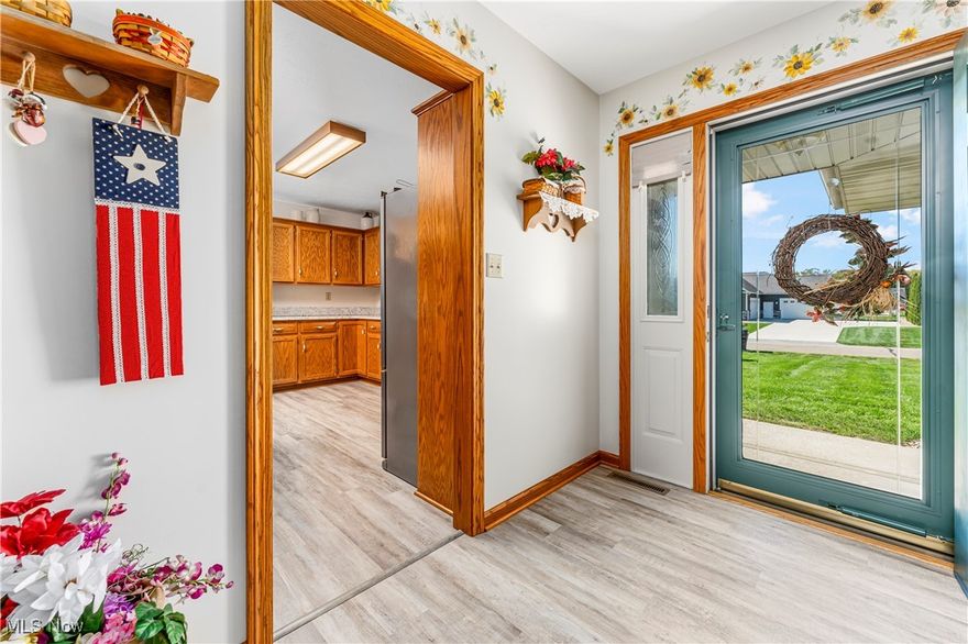 Step into this beautifully designed home, where every detail has been thoughtfully crafted for comfort and convenience. The kitchen is perfect for meal prep or entertaining guests and boasts sleek stainless steel appliances, quartz countertops, ample workspace, and plenty of storage for all your cooking essentials. The dining area opens up to the living room, creating an inviting space that flows effortlessly for socializing and relaxation. You'll appreciate the laundry room with its built-in cabinetry and a utility sink, making chores more organized and efficient. The bedrooms are spacious, with the master bedroom offering dual closets and an ensuite bath that includes a large vanity and a beautifully tiled walk-in shower. The main floor is finished off by two other bedrooms and a guest bathroom that provides a large vanity sink and a convenient shower/tub combo. Step outside to a large backyard with a deck, perfect for outdoor lounging or summer barbecues. A shed is included for storing all your yard tools and equipment. The basement, measuring a generous 35x49, is unfinished and ready for your personal touch. It features a workbench and dual entrances from both the house and the garage and also has tall ceilings. Lastly, the 2-car attached garage offers deep space for extra outdoor storage, with a door leading to the backyard for easy access to outdoor chores. This home provides the perfect balance of style, function, and comfort, waiting for its next owner to move in!