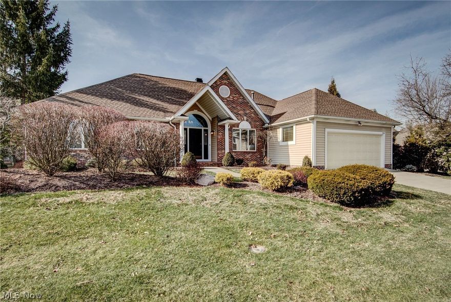 This well Appointed Detached Cluster overlooks the water and has a huge deck (with built-in planters) off the back of the the home. The home has an open floor plan with Real Hardwood Floors in the Foyer, living room and formal dining room. Also the den has built-ins and can be used as a third bedroom if needed. There are gas fireplaces in both the Living Room and Family Room !! The Eat-In Kitchen has ceramic floors , lots of counter space  and all the appliances. The Family room also has built-ins , high end laminate flooring and over looks the deck which overlooks the water. There is a first floor laundry room off the attached garage. The Master Bedroom Rocks !!! it has a master bath has a sunken Jacuzzi tub, double sinks and a make-up vanity which gives you the feeling of being in a 5 star Hotel (without the cost). There are 2 yes I said 2 walk in closets !! The roof was just replaced in 2011. The home has been well cared for over the years .... Come make this Beautiful House Your Ho