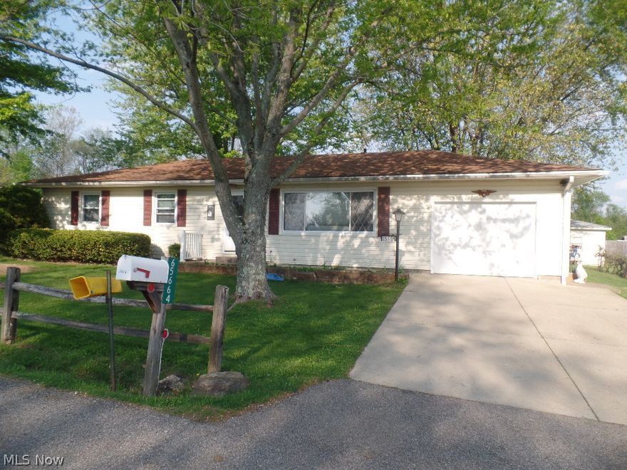 Lovely ranch home just outside of town w/beautiful country setting.  Many upgrades: gas line, water heater, gas furnace, central air, windows, & more.  Laundry/mud room just off garage, super large master bedroom (was originally designed to be a 3 bedroom home), nice updated bath, glass sliders off dining area to screened porch overlooking private backyard w/grape arbor & storage building (which makes a nice workshop)