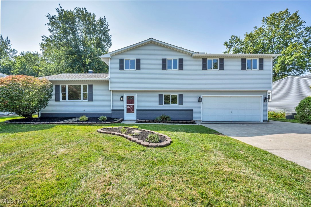 Completely remodeled inside and out, this beautiful home is truly move-in ready. Updates include brand new LVT flooring, plush carpeting, fresh paint throughout, all new switches, outlets, and light fixtures. The remodeled kitchen features refinished cabinetry and quartz countertops, opening to a bright dining room and living room.
Multiple living areas provide plenty of space for entertaining, including a first-floor family room that walks out to a heated four-season sunroom, leading to a beautiful inground heated pool and fenced backyard. A finished lower-level recreation room adds even more versatility.
Upstairs, the spacious master suite offers cathedral ceilings, double closets, and a remodeled bath with quartz countertops, new double-sink vanity, and a brand-new shower insert.
Every detail has been thoughtfully updated, making this home the perfect blend of style, comfort, and functionality in the heart of Willoughby.