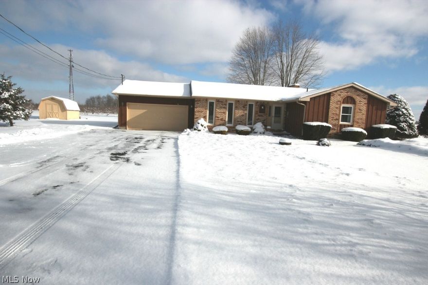 Imagine your dream Home that sits on a prime 1 Acre Lot! The beautiful Hardwood Foyer welcomes you into the 3 Bedroom, 2 Full Bath Ranch Home & leads to cozy Living Room. Gorgeous Ceramic Tile flooring in Kitchen w/over sized Breakfast Bar, Ceramic Back Splash & all Stainless Steel Appliances are included! Sliders off of the Dinette to lush Back Yard w/Shed & Patio. Kitchen Opens to the Hardwood Dining Room w/Ceiling Fan & Wood Burning Fireplace! Large Master Suite that has Double Closets & Updated Hardwood Master Bath. There are 2 other Bedrooms that are also spacious. Immaculate, dry Unfinished Basement that is waiting for your finishing touches. 2 Car attached Garage for your convenience! You can be worry free with this Home because there is a full One Year Home Warranty! New Roof, New Storm Door, Newer Furnace & Central Air Unit. This Home is close to the Vermilion River Valley, Metro Parks, Downtown Amherst & Downtown Vermilion! Everything is done & waiting for you in this Home, j