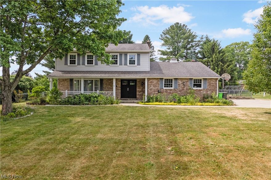 This 4-bedroom, 2.5-bathroom charmer displays contemporary architecture's angular charisma. The front door is within a pedestrian range of town center and shopping and dining options. Enjoy inspiring pool views. Step from the Welcome mat into an interior embrace that includes hardwoods in the living spaces and stylish lighting. In the kitchen, natural light sets the stage for culinary achievement. Tranquil master bedroom. The other three bedrooms are ready for styling. Finished basement serves as a rec room. Attached two-car garage. Exterior includes an inviting patio and refreshing pool.