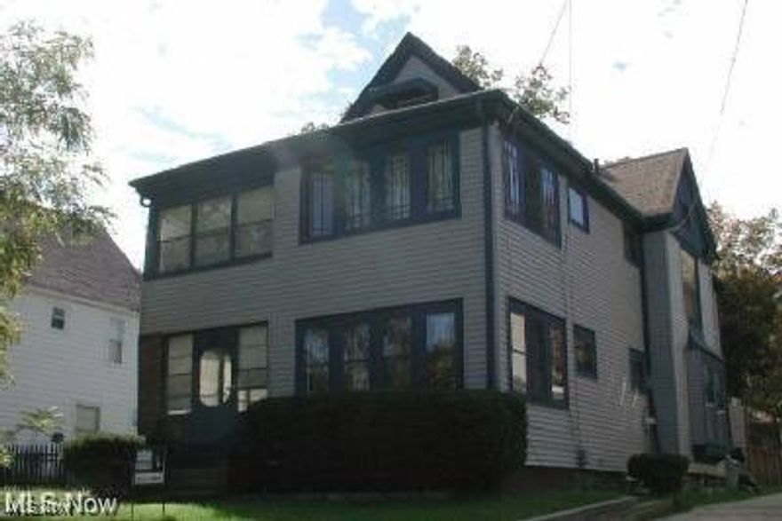 Rare opportunity for an investor or owner occupant in this  historic 1908 home on Akron's iconic Merriman Rd. Why pay rent when you can live for free in one unit? 1st floor unit is 1BR, 1BA,  formal dining room, sunroom,  hardwood floors, two fireplaces, and built-in floor to ceiling leaded glass bookshelves. Large 2nd floor is 2 BR, 1 BA, enclosed sun porch & more. 3rd unit is efficiency. The property includes a private fenced backyard, 2Car Garage, off-street parking, and is within walking distance to shops, restaurants, and the Mustard Seed Market. Utilities are not separately metered & paid by owner. Building is smoke and pet-free. Exclude 1st floor Bedroom Curtains. Seller is a licensed real estate agent in the State of Ohio.