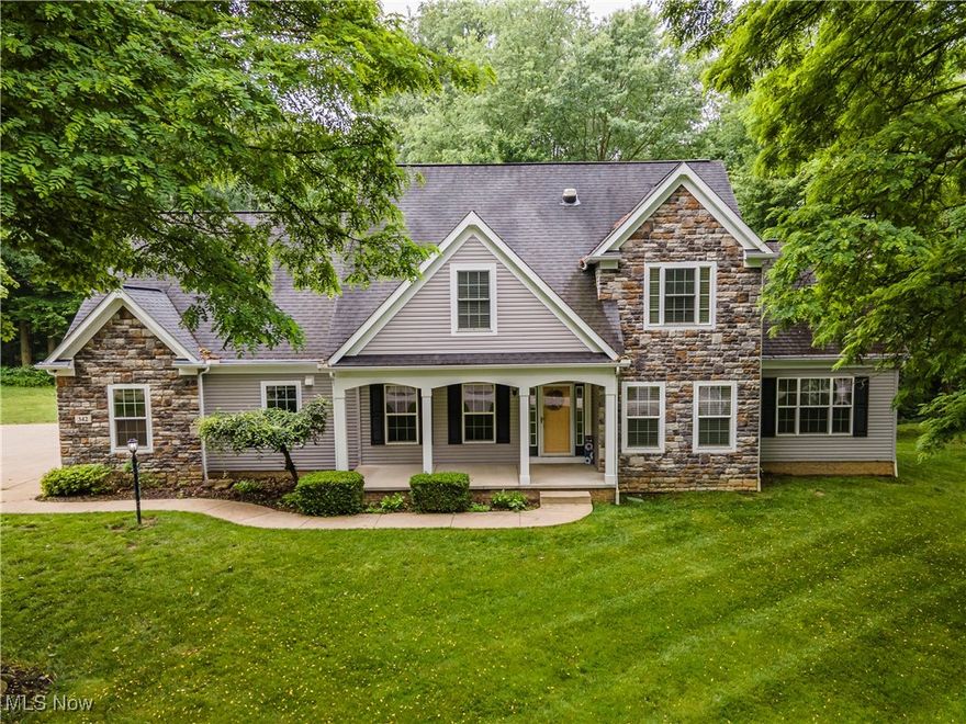 Amazing home located in Green School District on 2 acres. Nestled in the serene landscape of Clinton, Ohio, this captivating house offers a harmonious blend of comfort, space, and potential. With five bedrooms and five and a half bathrooms spread across an impressive 5,007 square feet, this home is a haven for those who appreciate room to breathe and grow. Featuring an in-law suite, perfect for multi-generational living, elevator potential if needed, Main level has 9' ceilings throughout and also consists of a huge great room w/vaulted ceilings, secluded office space with glass french doors, dining room connected to the kitchen, 1st for laundry, half bath, 4 seasons room off the kitchen. Heated 4 car attached, and 4 car detached garage. Detached 30'x 40' garage with two 10'x12' overhead doors with also utility sink and its own 200 amp electric service, and a 3rd standard garage door, walk up loft, 12'x40' over hang area for RV/ boat. , a spacious finished basement, Outside, ample parking. Trex Deck, New HVAC 2020 and Generac generator. While Boettler Park offers a green oasis for family fun and relaxation. This home isn't just a house; it's a lifestyle waiting to be embraced. With its blend of space, potential, and community, it's the perfect setting for creating lasting memories. Don't miss the opportunity to make this exceptional property your own personal sanctuary. Schedule a showing today.