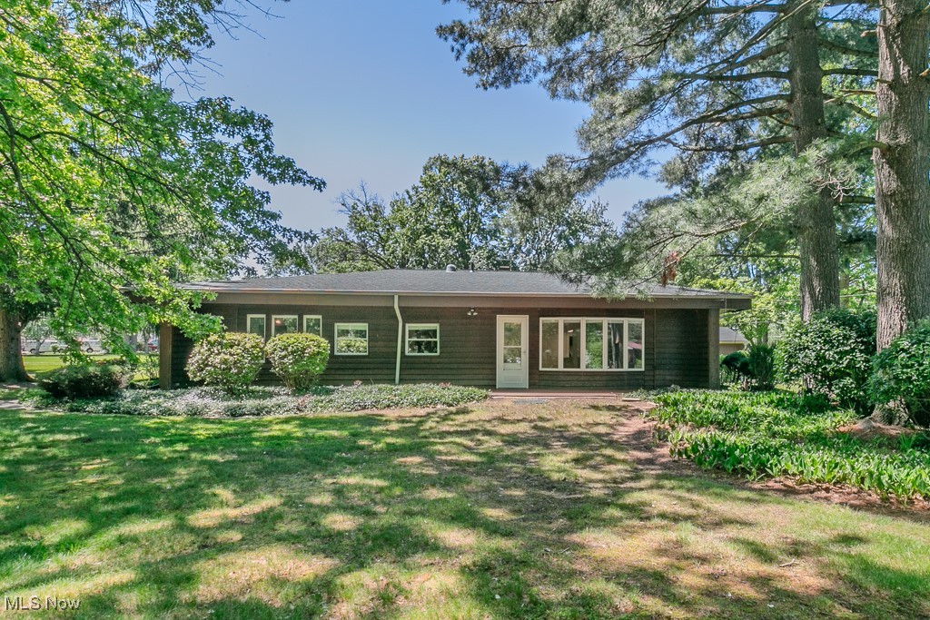This single-level, newly updated ranch home offers comfortable, accessible living in a spacious three bedroom, 2.5-bath layout. This home offers step-free accessibility making it ideal for anyone looking for their forever home. The renovated kitchen boasts beautiful quartz countertops, a breakfast bar, soft close cabinets, plenty of drawers, and all new stainless-steel appliances. The oversized main bedroom has an en-suite bath, double closets, built-ins, and private access to the covered patio for your added enjoyment. Each bathroom has undergone a total transformation. The original brick exterior is covered with cedar siding giving it a desirable rustic look and added insulation. Outside you will find an attached carport, large storage shed and wrap around driveway situated on a generously sized lot. Major updates include a new high efficiency HVAC system, new electrical panel, new hot water tank, new roof*, new LVP flooring, and newer gutters with installed gutter guards. Washer and dryer included. Schedule your showing today. *75% of the roof is new. The remaining section was also professionally inspected and found to be in excellent condition.