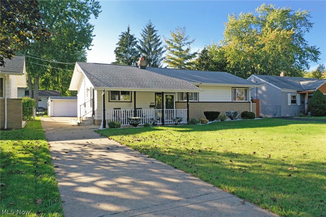 This updated 3 BR 2 BA ranch style home is conveniently located right in the heart of North Olmsted on a dead-end street and is move in ready! A covered porch greets guests and a large gated and fenced yard with a covered patio is a great place to enjoy company or quiet at-home evenings!
Bright, light-filled rooms and easy, simple one-floor living without losing storage, entertainment space or features. Hardwood floors throughout first floor. Lower level has been finished with a 4th bedroom with walk in closet or play room, large fan-cave to watch the games, a full bathroom and plenty of storage and utility space.
Eat-in kitchen remodel in 2010, upgraded with espresso cabinets and brushed steel fixtures, new lighting in the foyer and kitchen, granite countertops, all stainless appliances in 2017! West-facing dining room and living room with picture window overlooking the yard and sliding patio doors out to the covered patio. New roof installed August 2013! High efficiency furna