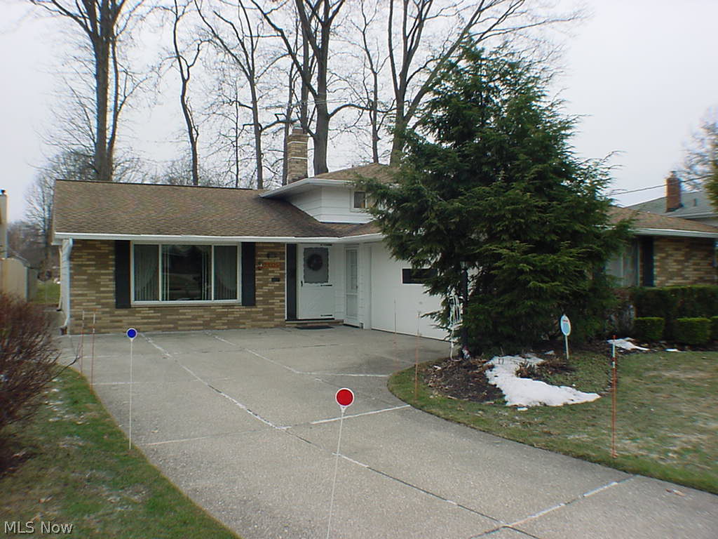 *Ask about our "Guaranteed Sale Plan* for your current home* Immaculate home in quiet neighborhood in ideal location close to shopping, entertainment, restaurants, I-90, I-480 and airport* Bright, open and airy layout with great flow from living room and dining room with high vault ceilings, bright white appliances and cabinets in kitchen with all appliances included and loads of counter and cabinet space* Spacious family room with accent brick wall and large brick wet bar for entertaining* Second full bath with shower stall off family room* Laundry area with washer/dryer included and access to garage* Energy efficient furnace with humidifier* Three spacious bedrooms on second floor with shared bath and access from master* Large rear patio with access from dining room and storage shed* Side load two+ car garage with opener* Home has been energy certified from Dominion East Ohio gas* Improvements include newer roof with 30 year guaranteed shingles, windows, insulation, security system a