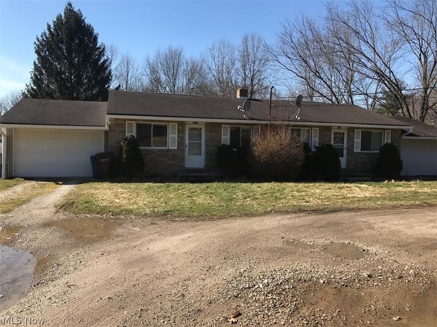 Charming two bedroom, 1 bath side by side apartment. New carpet, and fresh paint throughout. There is a large garage, A/C and a storage shed in the large backyard. Enjoy the country life just outside of the city. Don't miss out, call agent for more info.