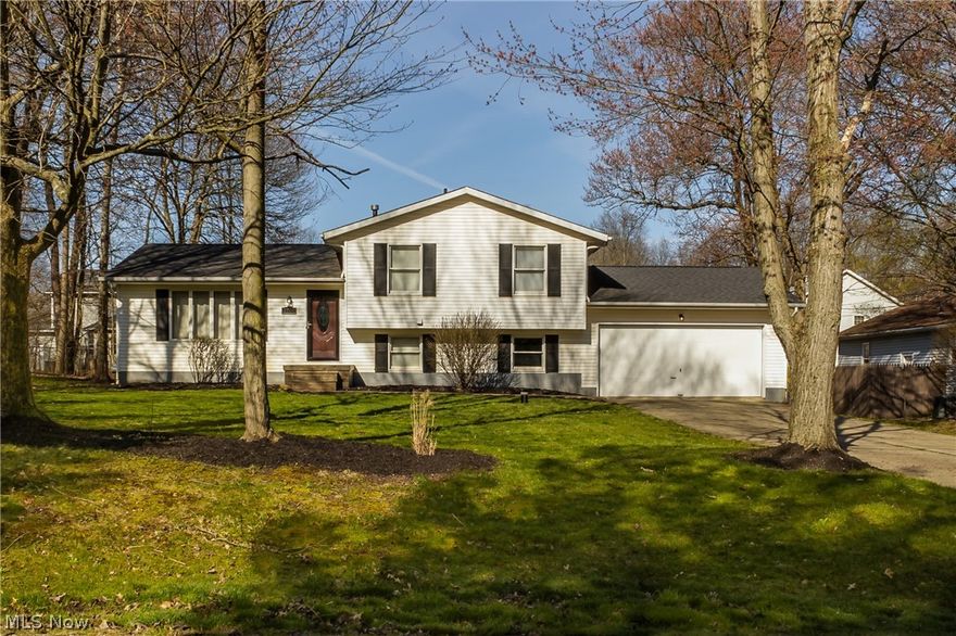 Welcome Home to this spacious, updated and well cared for home! This property is Pinterest worthy! Walk in through the welcoming front door and immediately feel at home. Take your coat off at the charming entry way bench, and enjoy the spacious front living room. Walk through to the formal dining room and check out the sliders out to the back deck! Off the dining room is the spacious modern kitchen with a custom build island and stainless appliances! The lower level offers a huge family room, laundry and full bath with an stylish barn door!!! Tons of additional storage in the basement. Upstairs you will find a roomy bathroom and 3 very nicely sized bedrooms. Great back yard. 2 car attached garage! Cut de sac street convenient to shops and restaurants. This house is amazing!  Many updates including dishwasher and microwave 2019, AC and furnace 2015, hot water tank 2017, roof 2015, waterproofed 2013.  Dont miss it!