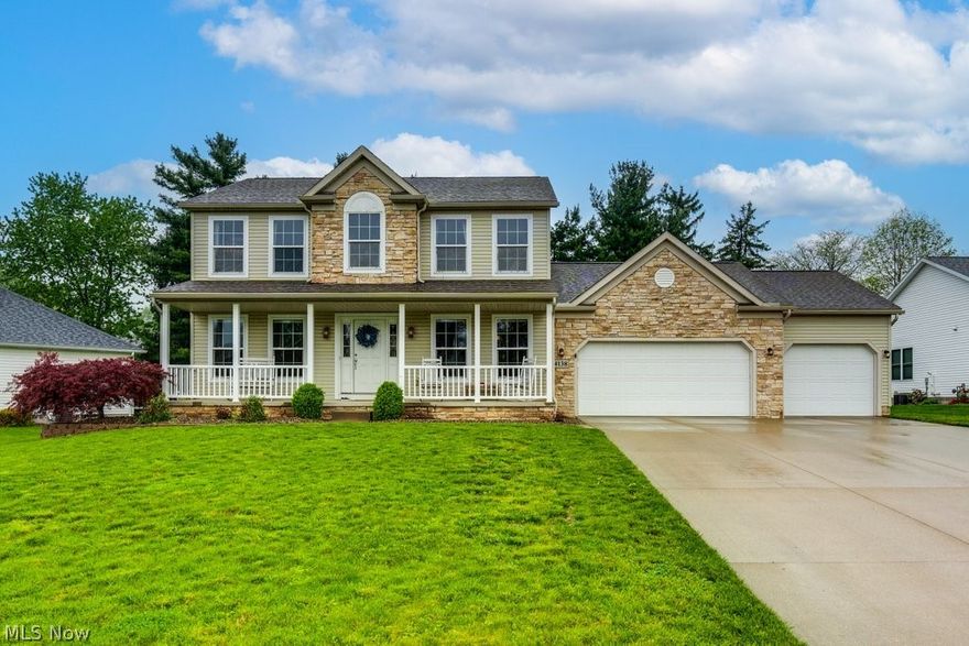 Welcome home to this lovely colonial located in the highly desirable Mogadore School District, offering over 2,000 sq. ft. of beautifully maintained living space! From the moment you enter, you’ll be impressed by the grand two-story foyer and oversized second-story window that fills the home with natural light and creates an inviting, open feel. The main level features a formal dining room with an elegant tray ceiling—perfect for hosting holidays and special occasions—along with a versatile office or sitting room. The spacious great room is the heart of the home, showcasing a cozy gas fireplace with a stunning stone accent and mantle, ideal for relaxing evenings. The kitchen is designed for both function and style, featuring stainless steel appliances, granite countertops, and a breakfast bar that flows seamlessly into the great room—perfect for entertaining. A convenient first-floor laundry adds to the home’s practicality. Just off the great room, you’ll find a stunning 14x18 family with sliding doors leading to a beautiful covered porch. This outdoor space is truly special, complete with a glass panel railing, ceiling fan, TV hookup, and cable—ideal for enjoying warm evenings. Upstairs, the spacious owner’s suite offers a walk-in closet and a luxurious en-suite bath with a garden tub, double sinks, and a separate shower with water jets. Two additional generously sized bedrooms and a full bath complete the second level. Additional highlights include a new roof (2019), HVAC (2024), hardwood flooring in kitchen, dining room, hallway and laundry room (2022), new carpeting (2024), Furnace (2024), Water Heater (2024) and an oversized 3-car garage. This move-in ready home truly has it all—space, style, and comfort—both inside and out!