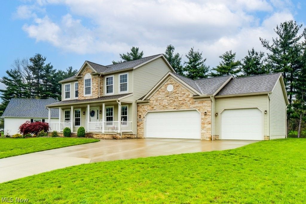 Photo of 4138 Whispering Springs Lane, Mogadore, OH 44260 (MLS # 5205302)