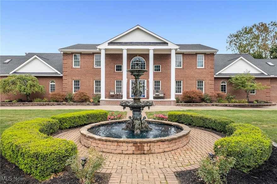 Welcome to 6701 Crosse Rd in Amherst, an extraordinary estate offering unmatched space, amenities, and updates. This massive property sitting on 7.56 acres features 9 bedrooms, 5.5 bathrooms, and an 8-car garage, making it ideal for multi-generational living or entertaining on a grand scale. The main house, originally built in 1999 with an addition in 2003, includes an in-law suite with a private entrance and garage that boasts 3 bedrooms, while the main living space offers 4 bedrooms. The 1,150 sq. ft. guest home adds 2 bedrooms, 1 bathroom, a custom bar, and a golf simulator, creating the perfect space for visitors or entertaining. The septic system in the GH was replaced in 2022, ensuring modern convenience and reliability. The main house and GH have been extensively renovated with new kitchens, bathrooms, plumbing, electrical, flooring, trim, paint, and doors (2018–2019). Other upgrades include a new roof (2017), new boiler (2025) in the main house, whole-home generator (2019). Outdoor highlights abound: an indoor saltwater pool with new heater (2023), a  760,000-gallon pond (2021), bocce ball court, pergola (2018), outdoor fireplace with swing (2021), nature stone throughout the property (2019–2020), and extensive walkways and lighting (2022). The she-shed, renovated in 2020, includes a second floor with a half bath. The property also features a pumping station for water management, 2, 9-hole frisbee golf courses, and an orchard of 70+ trees, including 15 fruit trees. With brick entry columns, wrought iron fencing, new mailbox (2019), resurfaced driveway (2022), and sprinkler systems (2022), every detail has been considered in this property. 6701 Crosse Rd is more than a home, it’s a private retreat and a once-in-a-lifetime opportunity.