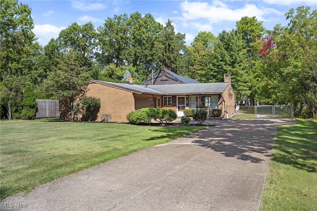 Seldom Found Situation and Opportunity .... Sparkling Clean Westlake Brick & Stone Ranch with Brand New Huge Semi Finished Major Addition .... Beautiful 300' Wooded Setting on Desirable Cul-de-sac Near Clague Park .... Enormous New 3 Car Side Load Attached Garage with Tall Overhead Doors, a Floored 40' Loft Attic with 5 Velux Skylights and 1/2 Bath Area .... Plus the Existing 2 Car Attached Garage with Plans to Convert this Garage Space into Living Area for a Special Master Bedroom Suite .... This New and Organized Addition Includes Brand New Pella Windows .... Existing Living Room Area with Full Brick Wall Cozy Fireplace is Ready to Expand with Drawing Plans .... Addition in Place Includes Relocating Kitchen, Adding New Utility Room, Adding New Full Bath, a 1/2 Bathroom and More .... Notice Extra Brand New Certainteed Landmark Roofing Shingles and Vinyl Siding Are Stored In Garage To Cover Original Dwelling are Included .... Extra Large Storage Shed .... Tremendous Upside Potential with Location, Location, Location.