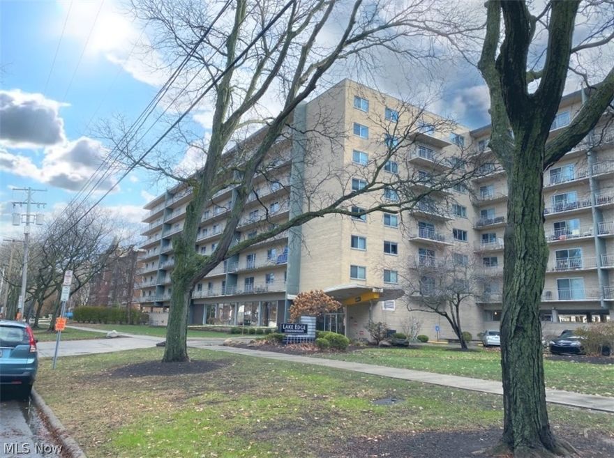 Welcome home to 10301 Lake Ave in Cleveland, Ohio! Located in the desirable Edgewater Park area! This condo is one of the largest sized condos in the building and located on the 7th floor, which boasts of a large balcony with lake views. Natural light from the balcony doors create a welcoming environment in the open concept living space. The kitchen brings the outdoors in with its brightly painted cabinets and all of the appliances stay! The dining room has a gorgeous view of Lake Erie and is open to the living room. There are 2 bedrooms and 1.5 baths in this condo. The primary bedroom features a large closet and leads to the half bath. The second bedroom could also be used as an office space - perfect for working from home! Put some TLC into this unit to make the spaces perfect for you! Lake Edge Condos are owner occupied and offer many great amenities including an indoor pool, a hot tub, a gym, a rec/game room, and a meeting space. There are also two laundry rooms on the floor. Inclu