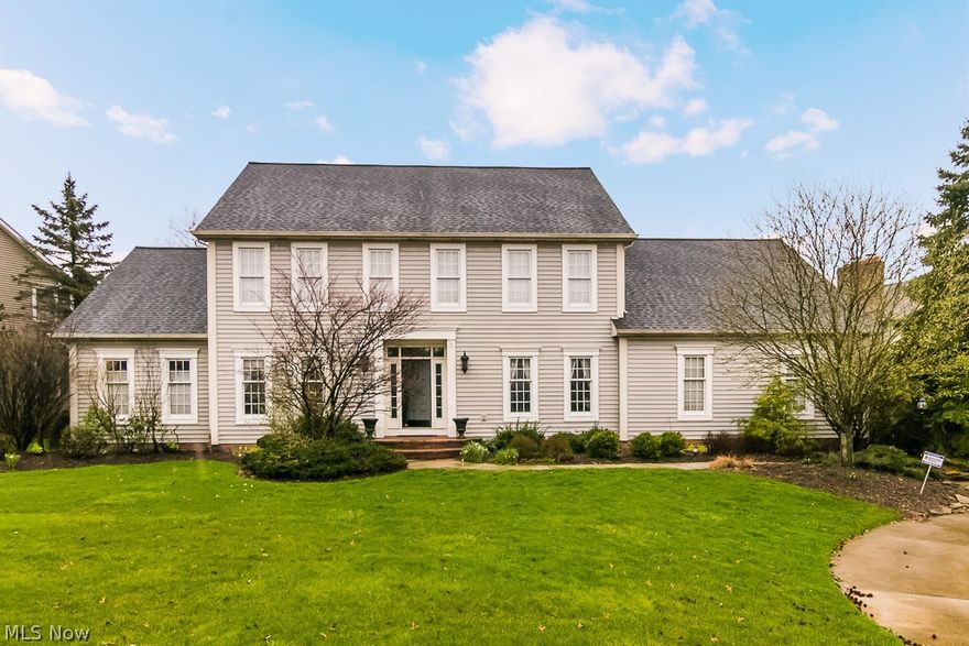 You won't want to miss this opportunity to own this fabulous five bedroom colonial within walking distance to the popular downtown Hudson area! The first floor of this beautiful home features Brazilian Cherry wood flooring throughout, formal dining and living areas, family room with gas fireplace and dual french doors that lead to deck.  The kitchen features white cabinetry, granite counter-tops (2007), decorative ceramic back-splash (2007), corner pantry and all appliances stay with the property.  Large eat in area complete with lots of windows to view the gorgeous backyard plus a sliding glass door that leads to deck/backyard.  First floor laundry and 1/2 bath.  Owner's suite on first level with dual fireplace (shared with living room), two walk in closets, dual vanities (bath remodeled 2016) and tons of storage for linens. Dual staircase leads to cat walk upstairs that overlooks family room, loft area perfect for a desk or lounging chair.  Three spacious bedrooms two of which have t