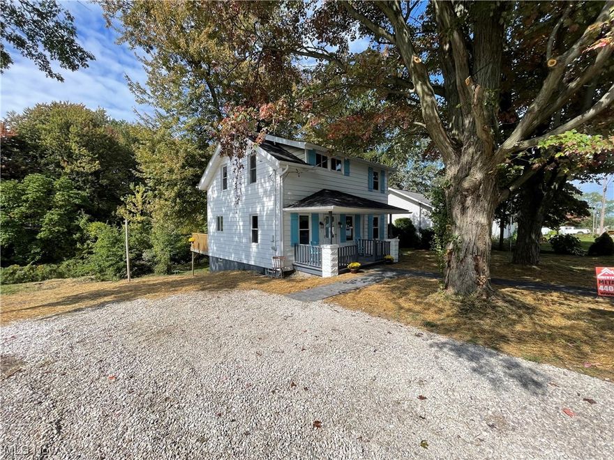 CUTE AS A BUTTON !! Come check out this remodeled 4 bedroom 1 1/2 bath 2 story home. Walk into the  spacious great room with new vinyl flooring and new kitchen to cook your holiday dinners and visit with your family at the same time. Also on first floor is one bedroom and remodeled half bath. Upstairs we have 3 more bedrooms all with new carpet and remodeled full bath and bug hall closet. Master bedroom is huge. Big full clean basement with walkout to sloping lot down to a creek. Sit out in the morning on your deck and have your coffee. New kitchen, baths, light fixtures, roof, hot water tank, windows, back sliding door, updated electrical and plumbing, furnace around 2 years old. This home is ready  for you to just move in !!