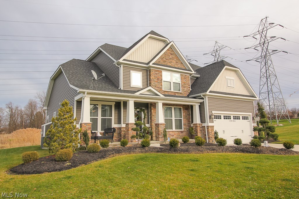 Why wait months & months for your new build when this home is BETTER than new? The owner took advantage of every upgrade available at the time of build making this home like none other in this beautiful development! Exterior & interior upgrades include but are not limited to the following: the highest tier of elevation package with stone, full front porch, luxury plank flooring throughout foyer, half bath, and kitchen. The gorgeous open floor plan highlights a chef’s dream kitchen with natural light, upgraded white cabinets with under cabinet lighting, a vast center island, desk area, spacious eat-in area, and stainless appliances. The family room features a detailed custom ceiling with a cozy fireplace. Heading up stairs you’ll notice the upgraded iron spindles that give it that extra something special! The capacious master suite has an extended sitting room, boutique-like walk-in closet, and private bathroom with soaking tub, double sinks, private toilet room, and stand alone shower.