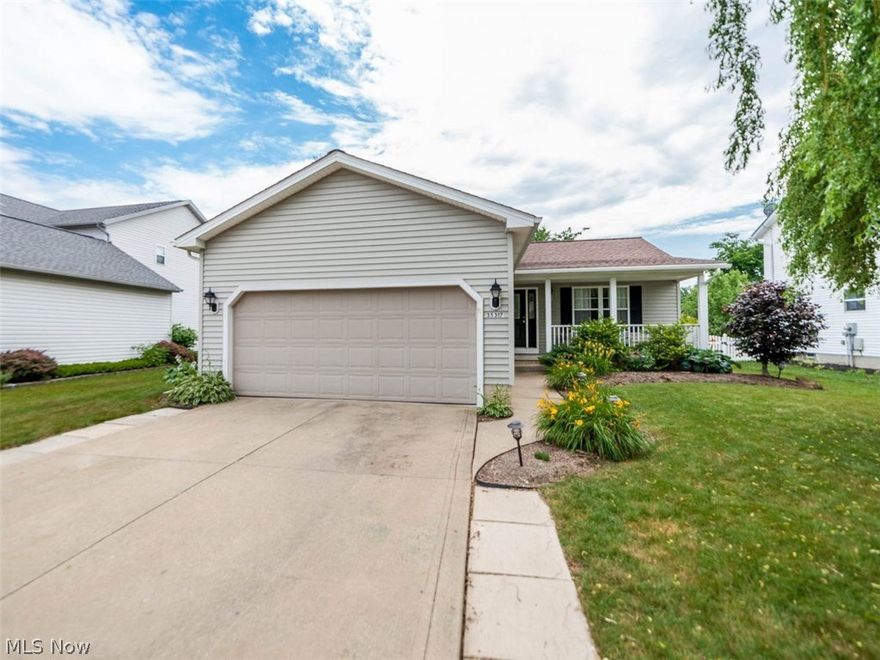 You'll love this gorgeous split level located in a desirable quiet neighborhood. Situated on the north end of North Ridgeville allowing easy access to all the shopping Avon has to offer along with being in close proximity to Cleveland's 3 major highways (I-90, I-480 and I80). Walk in the front door and fall in love with the open first floor with vaulted ceilings. New walk out deck located right off the dining room. The upstairs includes a Master Bedroom and en suite bathroom with an abundance of closet space, two well sized bedrooms and a full bathroom. The lower level includes a laundry room that comes off of the garage and another full bathroom in addition to a family room that is very well light by natural light. Basement provides room for lots of storage and is ready to be finished. NEW roof installed in 2011, sliding glass door 2018, and irrigation system for the whole yard.