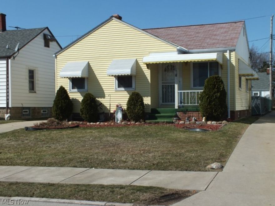 This wonderfully maintained bungalow is a MUST SEE. This fresh and clean home features 2 nicely sized bedrooms with new carpeting and a newly remodeled adjoining bathroom with tile flooring, tile accents and new plumbing fixtures. The kitchen offers new wood laminate flooring with a gas range and side by side refrigerator. The ample living room is partially furnished with newer carpeting. 
The waterproofed basement is fully finished with new carpeting, full tile bathroom with shower and newer washer and dryer. 
The outside of the house also features a private fully fenced backyard, single car garage, restored concrete driveway and cozy deck with bedroom access. The roof and windows of this wonderful home are also newer. Put this home on your list as a MUST SEE. With close Metro Park Access and close proximity to the hospitals, this home has it all and WON'T LAST LONG. Spring is a great time to plant flowers and watch them bloom in your new home. Schedule Your Appointment Today.