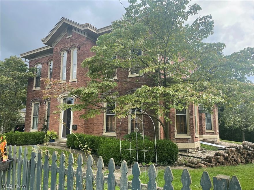 EXQUISITE and ELEGANT....only a few of many words that describe this 1860 built Historical home on 3+ acres of meticulous landscape which includes a grape arbor, stone works, multiple flowering trees, bushes, flowers, plus a premium deck and splendid slate patio to enjoy the beauty! The listing includes the main home and 2 above-garage refurbished apartments that provide additional income. This estate has been impeccably restored and remodeled in keeping with the integrity of the original craftsmanship to include numerous modern amenities: with all new roofing & super-high efficiency boiler in the main & apartments, Culligan water system, brand new ceilings, crown moldings, lighting, fans, well-appointed dream kitchen with top-of-the line double ovens/cooktop, renovated bathrooms, sanded & refinished flooring throughout this abode is MOVE IN READY FOR YOU!!! During your visit, your expectations will be exceeded as you will discover the unparalleled artistry & style throughout.