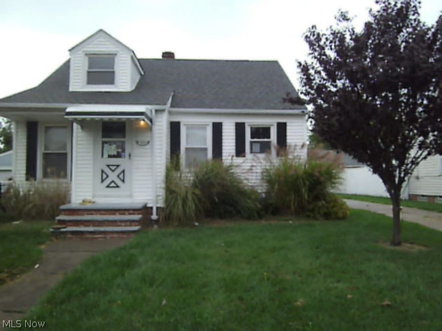 This 3 bdrm/1bath, Vinyl Bungalow has a 1 car detached garage. Home has hardwood floors and carpeting. Newer kitchen cabinets and some replaced windows.Also, a newer roof. A large bedroom with a bonus area upstairs that can be used as an office/ play area. Close to schools, shopping and hospitals. Easy access to downtown Cleveland.