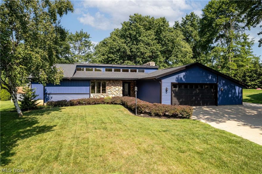 Welcome Home! Trust me, you wont fine another home like this in Wadsworth Ohio! After 25 years selling here I have been waiting for this Modern Mid Century Home to be listed. Just pulling down this street you want to see the inside of this ranch. The large lot will blow you away from the beginning. Then as you enter the home, the open floor plan with sunken in gathering area around a gorgeous fireplace with stone from floor to ceiling and the sun that comes in from the windows from front of the house. I can just see myself with a glass of wine and some friends sitting here doing this weekly. Holidays will be just wonderful here for sure. The Left end of the house offers an owners suite with full bath, laundry room and two more large bedrooms and the family bath with large jetted tub. The kitchen offers everything you need and access to awesome sunroom and large backyard. This home has had so much love and many memories made in it and is waiting for you to continue with your family, call for your private shwoing today!