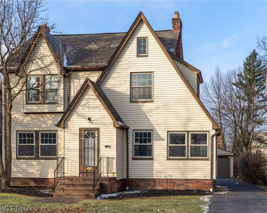 Renovated Five-bedroom colonial on a quiet street. A large living room with a fireplace is ready for family and friends gatherings. Eat-in kitchen with granite countertops, plenty of cabinets, and New stainless steel appliances. The bright dining room is right off the kitchen and large enough for dinner parties. The enclosed sunroom is a bonus. There are three bedrooms on the second floor and a fully renovated bath in the hall. The third floor offers a large private bedroom with a cedar closet and could be used for recreation. The basement offers plenty of storage and has a full bath with a jacuzzi. Two-car detached garage.  Close to Schools, Library, shopping, parks, and much more. Easy access to Downtown, Cleveland Clinic, University Hospitals, and University Circle. One year home warranty is included for your peace of mind. Property will be POS compliant at the time of Title Transfer.