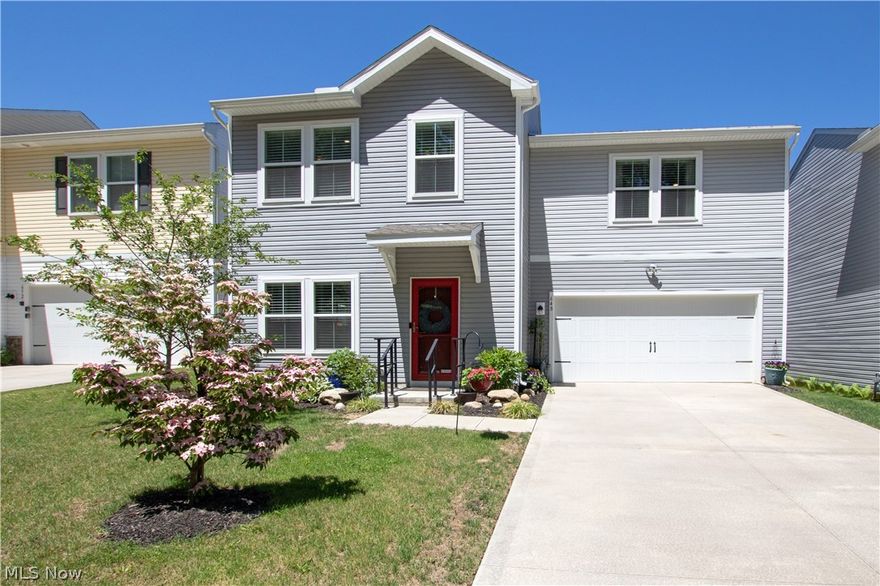 Welcome to this beautifully designed 4-bedroom, 2.5-bath home with a 2-car attached garage, offering modern living and convenience. The main floor features an inviting open-concept layout, seamlessly connecting the living room, dining area, and eat-in kitchen. Perfect for entertaining, this space provides easy access to the yard and patio, ideal for outdoor gatherings. A half bath on the main floor adds to the functionality. Upstairs, you will find all four bedrooms, including a luxurious primary suite complete with a private bath and spacious closet. The convenience of second-floor laundry makes chores a breeze. The three additional bedrooms share a second full bath, ensuring comfort for everyone. With a tax abatement in place for the next 13 years, this home offers significant savings. There are several ornamental trees and lots of colorful perennials. It has a beautiful, smaller yard if you don't have much time for gardening. Close proximity to lots of community features including the newly renovated Perkins Pool (free to Akron residents), the Akron Zoo, University of Akron, etc as well as quick access to highways and downtown amenities. Don't miss the opportunity to make this stunning property your own!