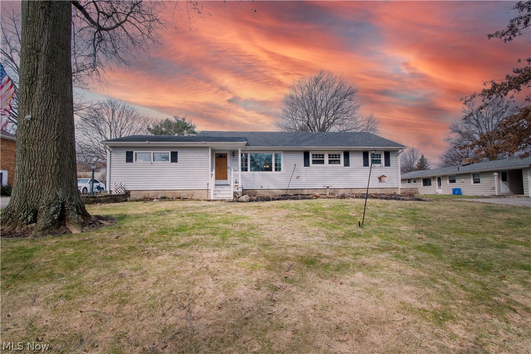 Welcome to 770 Woodland Ave in Wadsworth. This lovely ranch-style home has a lot to offer, four bedrooms, 21/2 baths, hardwood floors throughout the main floor, lots of storage space, and over 2,177 Sq Ft of living area. The living room is bright & spacious with a large picture window and an open concept to the formal dining room. The eat-in kitchen has plenty of cabinets space, appliances, access to the garage, and a pass-thru to the family room, which has a wood-burning/gas fireplace, a nice bay window, and sliding doors onto the 3 season room. The enclosed porch/3 season room is ideal for relaxing and entertaining and leads to the fenced-in backyard. The main floor has three bedrooms, including the master bedroom, which has a master bath with a walk-in shower; also, there is a 2nd full bath with built-in drawers/shelves, a shower/tub with beautiful tile surround, and a large linen closet in the hallway. The partially finished full basement has a Rec. Room with lots & lots of built-i
