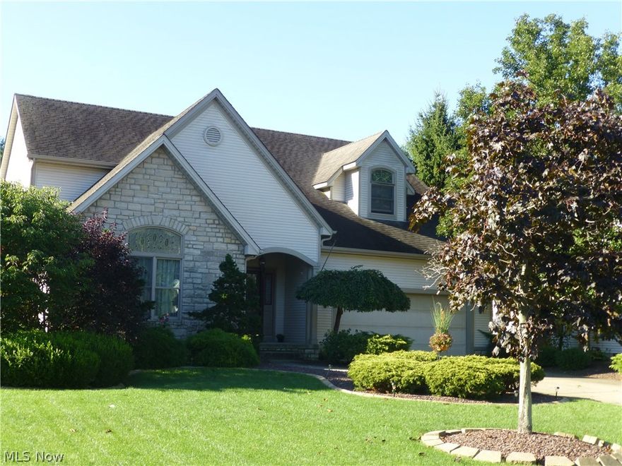 Beautiful Boardman home with great curb appeal!  When you pull into the driveway of this home, you'll notice the lovely landscaping, meticulous lawn and stamped concrete walk way that leads to the front door.  Once inside, the open foyer is stunning.  Formal dining room that has a gorgeous window, vaulted ceiling and spacious enough for large gatherings. The kitchen is a cook's dream featuring 35 oak cupboards, 15 drawers, butler's pantry, food closet, built-in china cupboard, desk, crown moldings and the appliances stay! Large and open,  this phenomenal area offers room for everyone and with so much  space, it will leave you wondering how to fill it all.  Great room is gorgeous and boasts a gas fireplace that is the main focal point of this spectacular room and new  flooring is a plus!  First floor laundry (laundry chute) and a  1/2 bath complete the first floor.  While you're walking upstairs, you will notice the brand new carpeting. Master bedroom is nicely appointed and offers Vaul