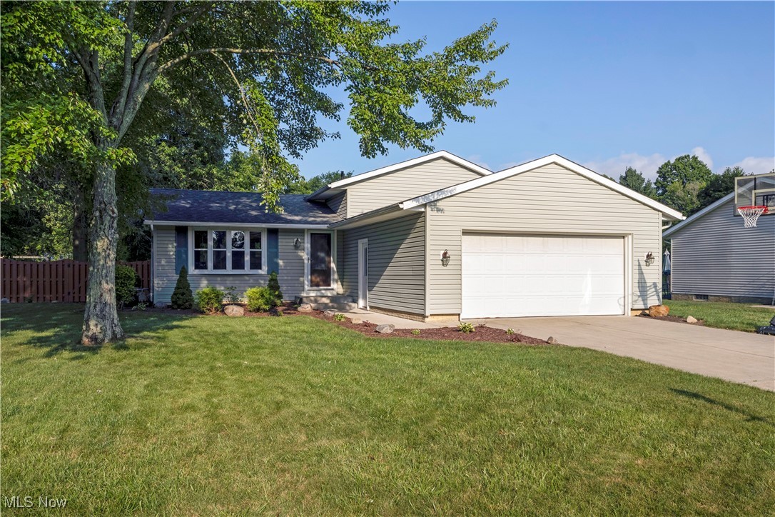 Welcome home to this three bedroom, one and a half bath split-level home in North Ridgeville! This property offers a wonderful blend of comfort, updates, and a great outdoor space. Step inside to find an open and inviting kitchen, thoughtfully redesigned with a butcher block island that creates the perfect gathering spot for meals or entertaining. The main living areas feature laminate wood flooring, adding warmth and durability throughout. Upstairs, you’ll find three comfortable bedrooms and a full bath, while the lower level provides additional living space and a convenient half bath—perfect for a rec room, home office, or play area. The exterior has been well cared for, with vinyl siding for low-maintenance living and a full tear-off roof completed in 2017. Outside, the spacious fully fenced yard offers plenty of room to relax, garden, or host summer barbecues. With a great location close to local amenities, parks, and highways, this home is move-in ready and full of potential for its next owner to make it their own!