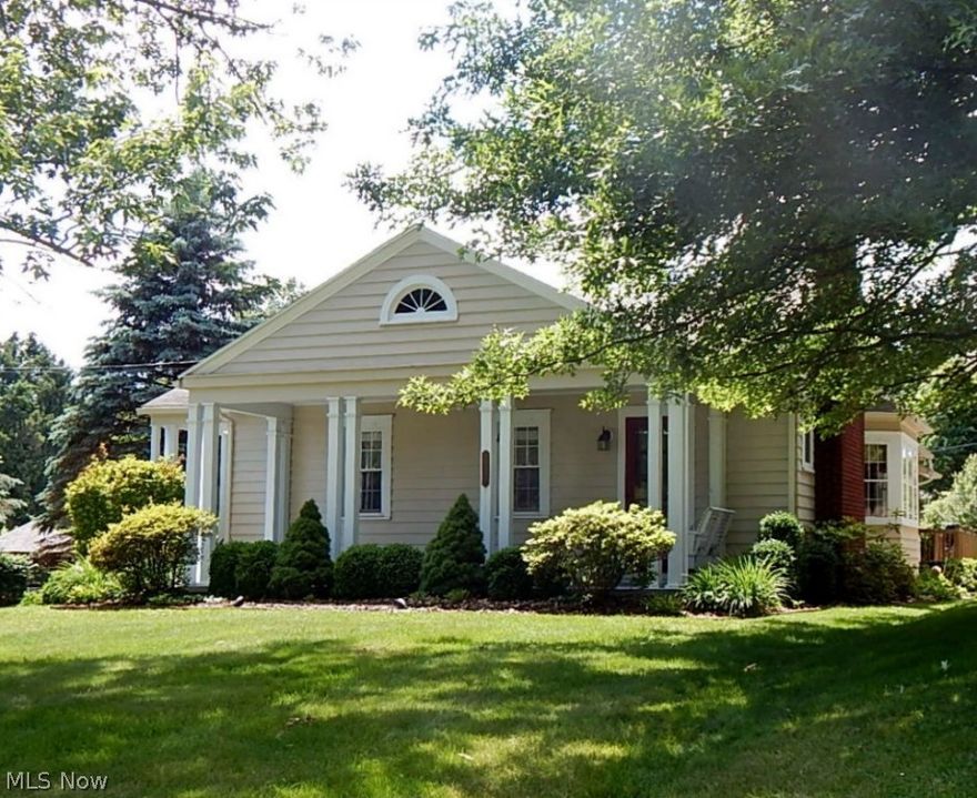 This home offers the charm of the 1940's with modern updates the best of both worlds, dining room with window seat (valances and matching pillows stay), living room offers fireplace, 3 bedrooms on the first floor, 1st flr. laundry, both baths have been updated, gorgeous kitchen with updated applianc, Corian Counter Top, beautiful cabinets and island (stools stay with the home), full basement, 2 car garage, covered front porch, patio, decking is maintenance free material, storage shed, extra lot extends to Woodside drive for additional access, lovely level lot.  Outstanding curb appeal.