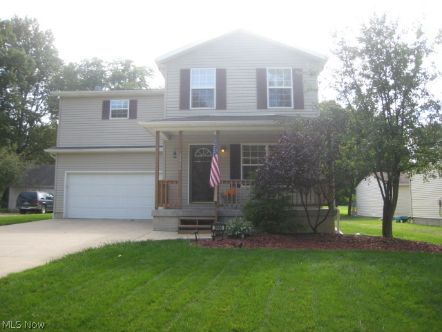 This lovely four bedroom colonial was built in 2005. It is move in ready. It has a cozy living room that opens to the eat in, fully applianced kitchen. You will be surprised at the size of the master bedroom. It is so spacious and has a glamour bath with garden tub and walk in closet. There are three other bedrooms and a full bath that complete the upper level. You can also sit out on your deck that overlooks the garden area and spacious lot. The 2 car garage is attached, and the shed in the backyard stays for extra storage. The basement is poured and plumbed for a bath. This home is a great value! The deck awning does not stay.