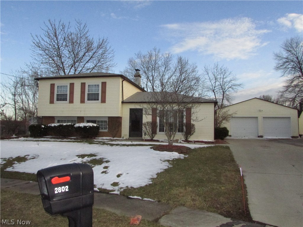 A remarkable 3 bedroom split level in Stow. This home features a 26x24 2 car garage that can fit all of your needs, and there is also a shed. The yard is completely fenced, and has a patio. The large living room is open to the remodeled kitchen. A 20x14 Family room is in the walk out lower level. The bedrooms are spacious. This home has many updates, and also features a metal roof.