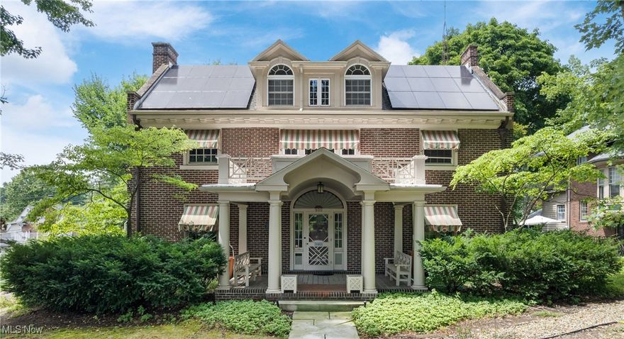 Step into one of Wooster’s most amazing homes—an exquisitely preserved 1915 Georgian-style estate offering nearly 6,000 sq ft of finished living space, where historic grandeur meets modern versatility. Zoned for residential and home-based business use, this historic home features a gourmet chef’s kitchen (2010 Ivan Weaver addition) with Wolf/Subzero appliances, granite counters, dual dishwashers and ovens, wine fridge, prep zones, and a butler’s pantry. Multiple living areas include a grand foyer, formal living and dining rooms (original chandelier, dining set, and chinaware included), sunroom, family room, rec room, and office spaces. The second floor boasts an owner’s suite with walk-in closet, sitting room, balcony, and Jack-and-Jill bath, plus three additional bedrooms—one currently a laundry/hobby room with drying cabinet. A finished third floor offers a large bedroom, cedar closet, and storage. The home can be used as a 5-bedroom, though one is set up as a laundry room, accounting for the difference from the auditor’s site. The walk-out lower level offers incredible versatility: a finished basement with plenty of recreation space or a home-based business space with separate entrance, address, lobby, offices, and conference room. Originally a yarn shop in the early 1900s, it later served as a law office. Accessibility features include an elevator servicing three levels, ramped patio, and accessible bath. Outside, enjoy a manicured oasis with stamped concrete patio, outdoor kitchen, fountain, greenhouse, screened gazebo, garden beds, stunning landscaping, and utility shed. Mechanical upgrades: new boiler (2023), whole-house generator, solar panels, modernized plumbing/electrical, many windows, and more. Built by the Rhodes family (Wooster Brush Co. founders) and lovingly preserved by the Broehl family since 1983, this is a rare opportunity to live, work, and entertain in timeless style. You’ve got to see it for yourself!