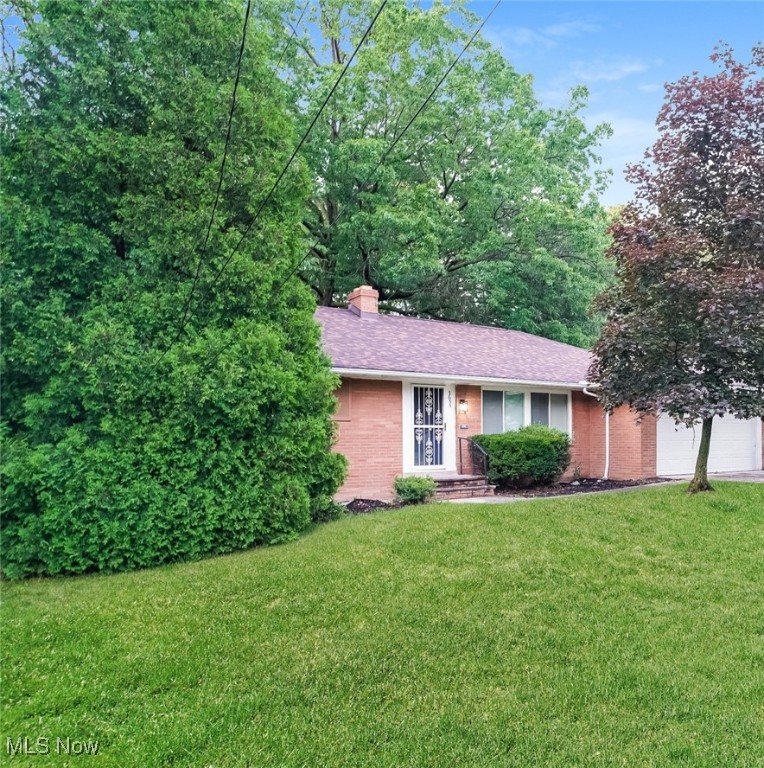 Welcome to 3655 Langton Road, a charming 3-bedroom, 2.5-bath brick ranch on a spacious 0.65-acre lot in Cleveland Heights. This well-maintained home features a light-filled living and dining area with a large bay window, an eat-in kitchen and a freshly painted interior throughout. The finished walk-out basement features brand new carpet and fireplace, perfect for a family room, office, or guest suite. The primary bedroom includes an en-suite bath and dual closets, while the attached 2-car garage provides convenient access. Located on a quiet street with mature trees and easy access to shopping, parks, and Cleveland Heights-University schools, this move-in ready home offers the perfect blend of comfort, space, and location.