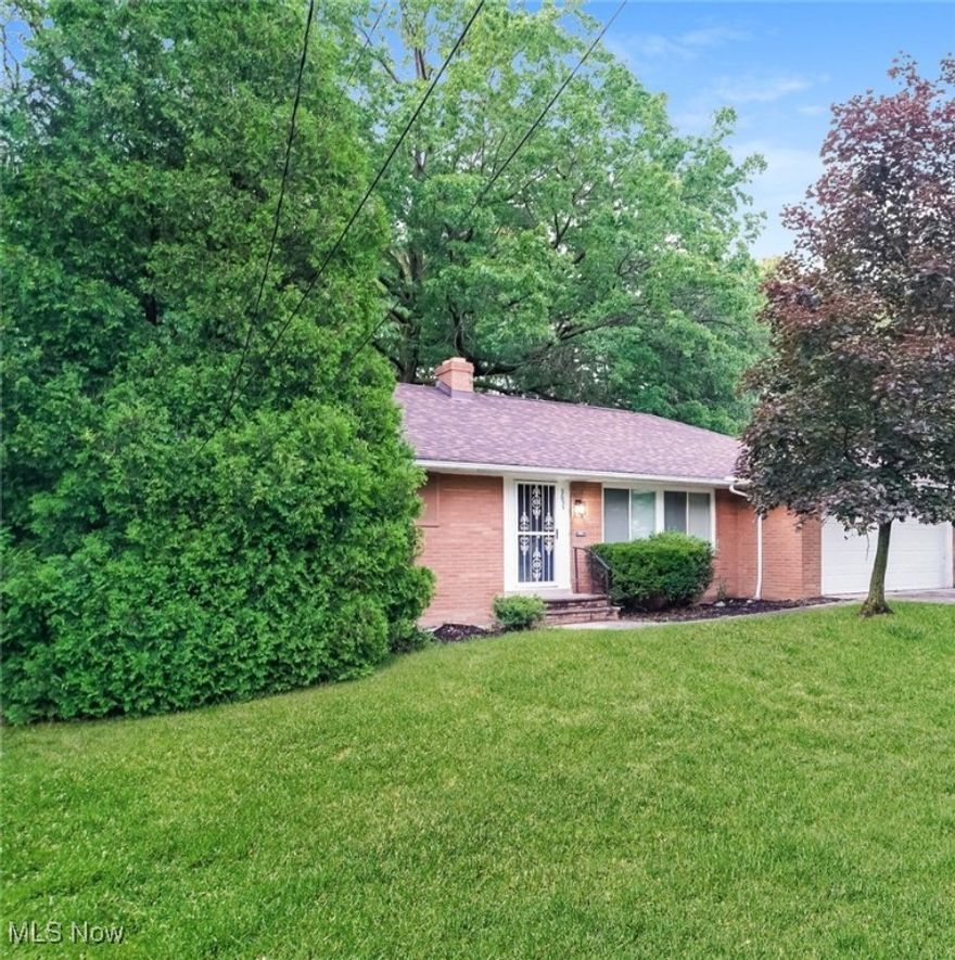 Welcome to 3655 Langton Road, a charming 3-bedroom, 2.5-bath brick ranch on a spacious 0.65-acre lot in Cleveland Heights. This well-maintained home features a light-filled living and dining area with a large bay window, an eat-in kitchen and a freshly painted interior throughout. The finished walk-out basement features brand new carpet and fireplace, perfect for a family room, office, or guest suite. The primary bedroom includes an en-suite bath and dual closets, while the attached 2-car garage provides convenient access. Located on a quiet street with mature trees and easy access to shopping, parks, and Cleveland Heights-University schools, this move-in ready home offers the perfect blend of comfort, space, and location. Point of Sale inspection is done and repairs are in progress.